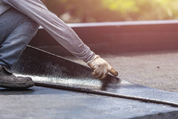Professional Interior Drainage System technician working in Newfield, NJ